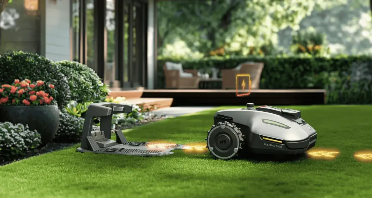 Robot koszący wraca do stacji ładowania, pokazując, jak działa robot koszący.